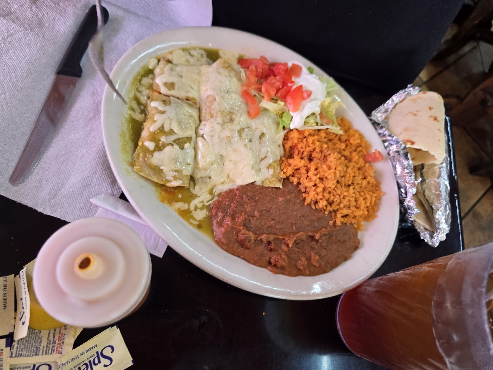 Plate of tacos with salsa and lime